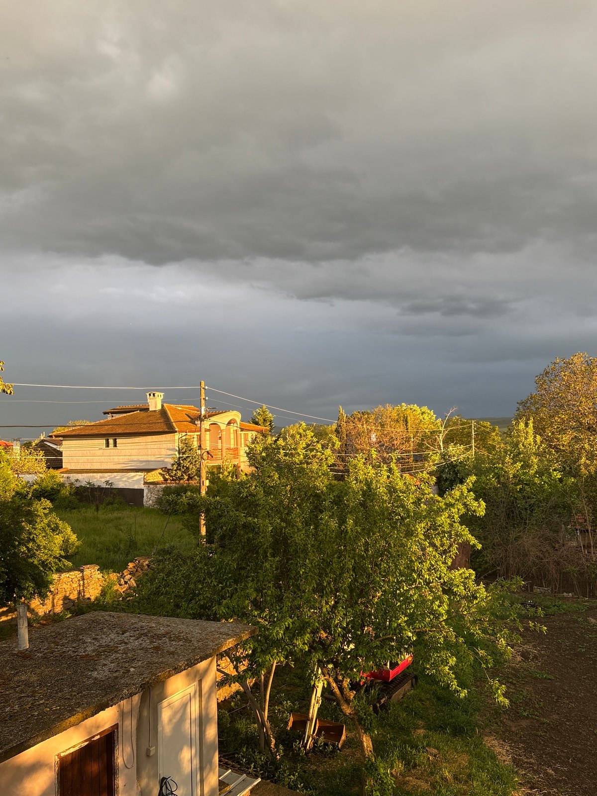 Rainbow emerges after storm clouds over Goritsa, Bulgaria