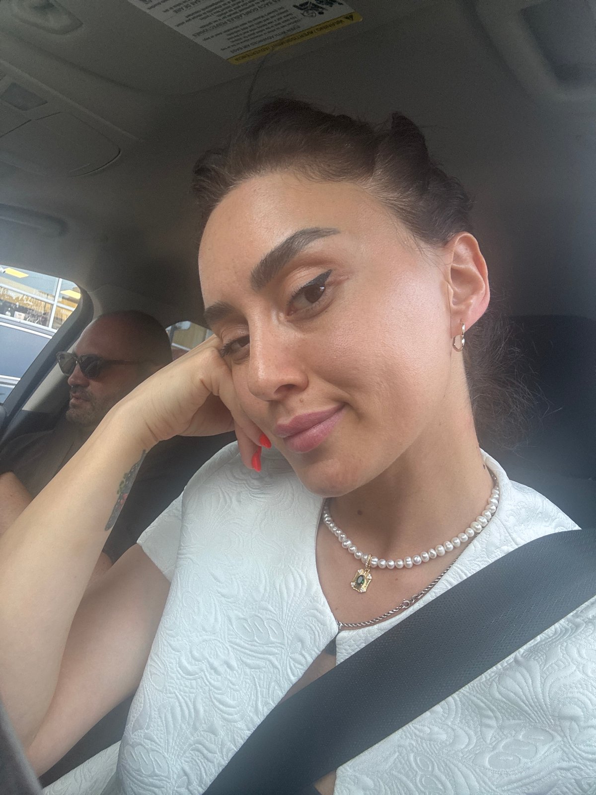 Woman travels through downtown Tbilisi during afternoon commute