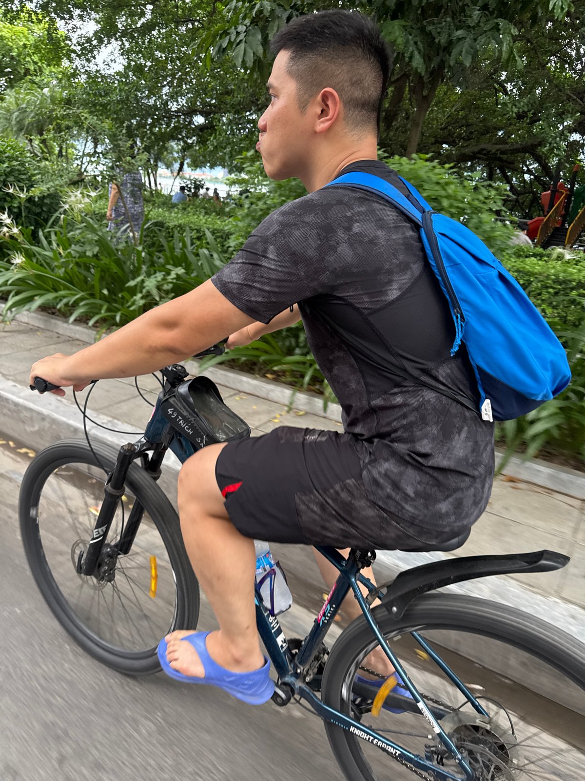 Everyday life along Hanoi's West Lake on a July morning