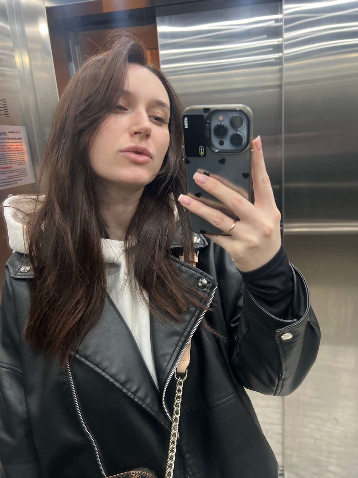 Woman documents cafe visit in Tyumen, Russia