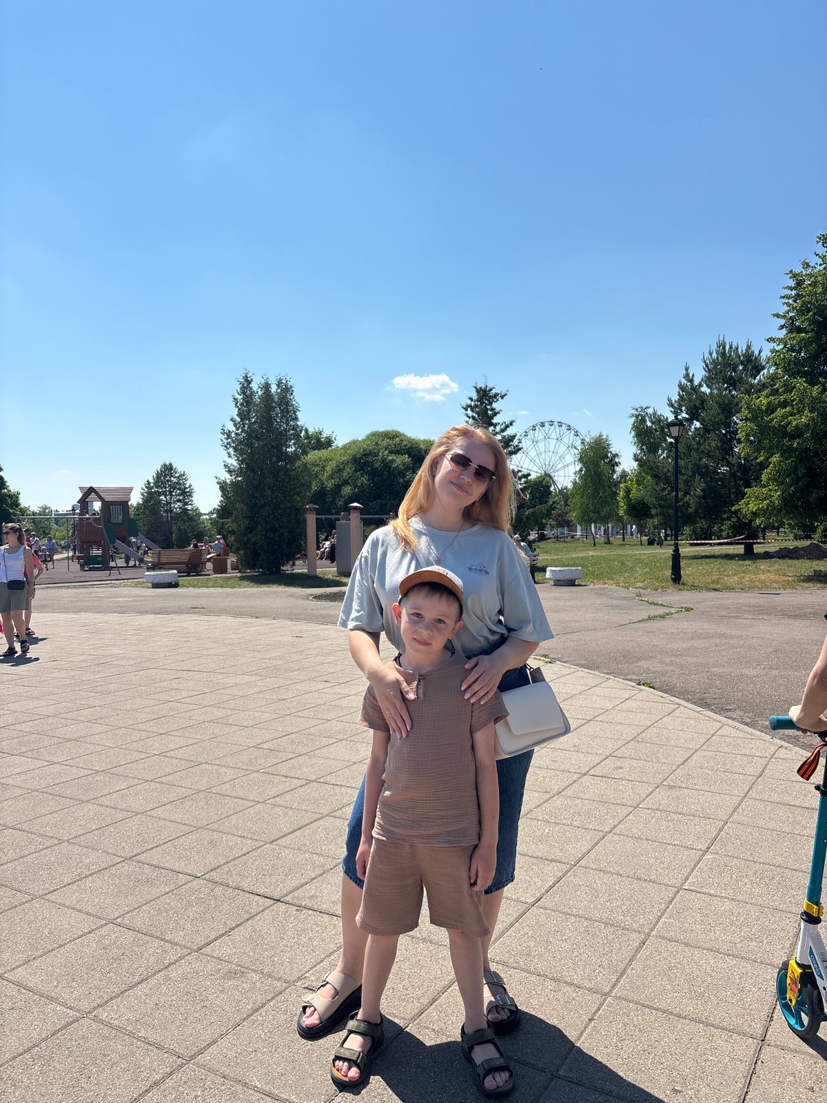 Family enjoys sunny day at Rusanovo amusement park