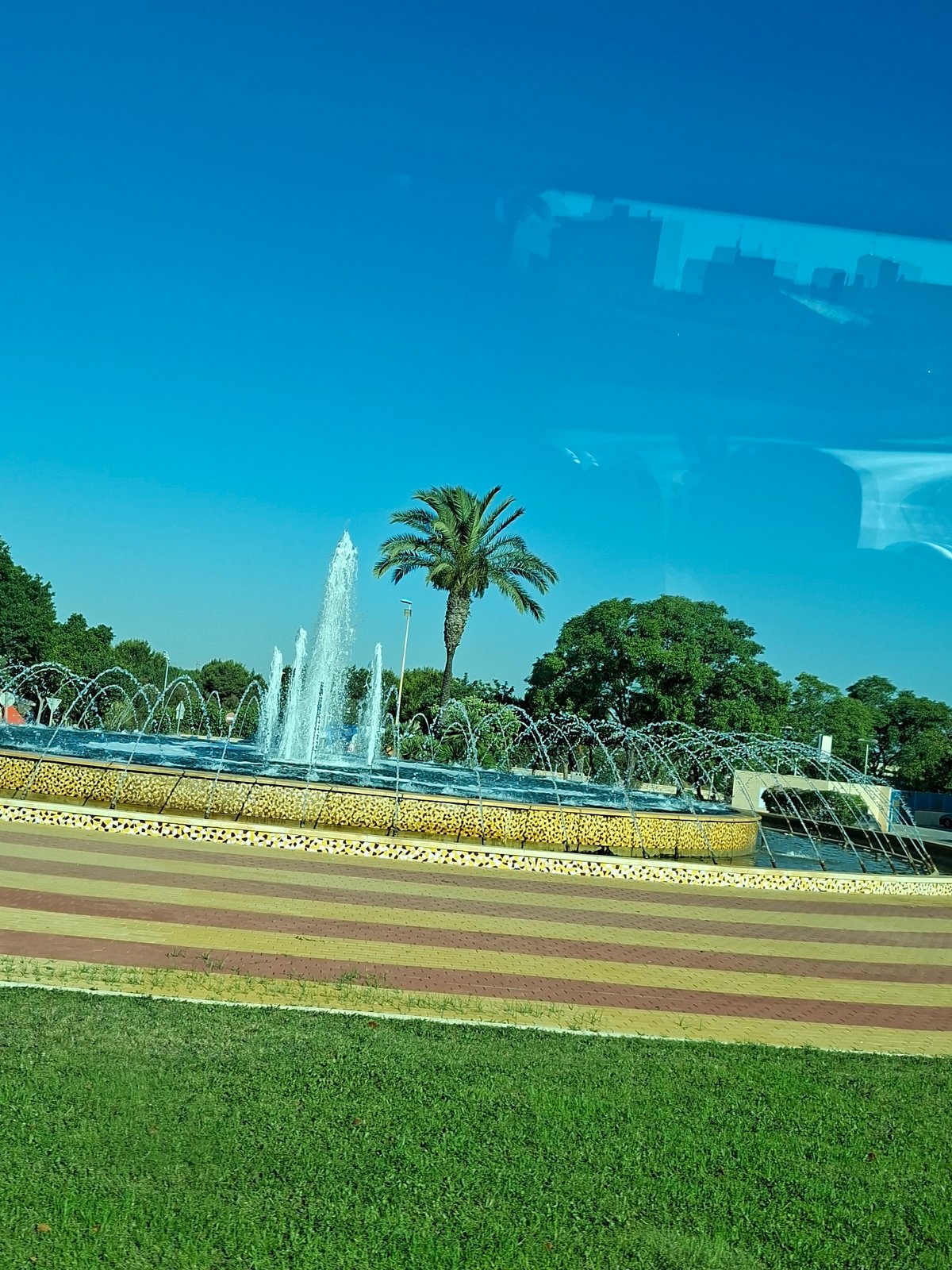 Sunny morning at a fountain park in Guardamar del Segura
