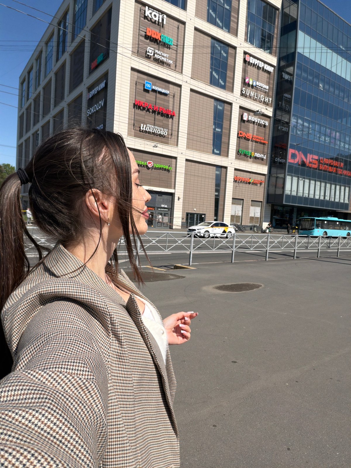 Woman photographed multiple times on Saint Petersburg street