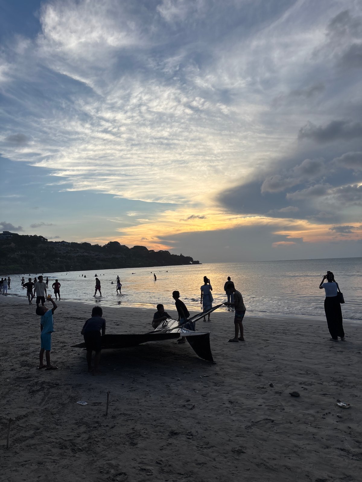 Sunset beach recreation captured at Kuta Selatan, Indonesia