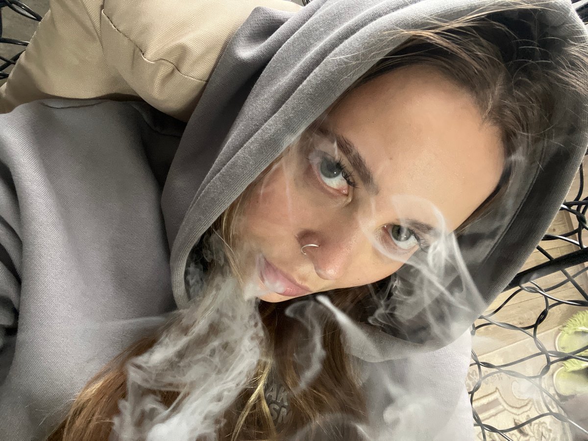 Young woman documents afternoon vaping session in rural Russia