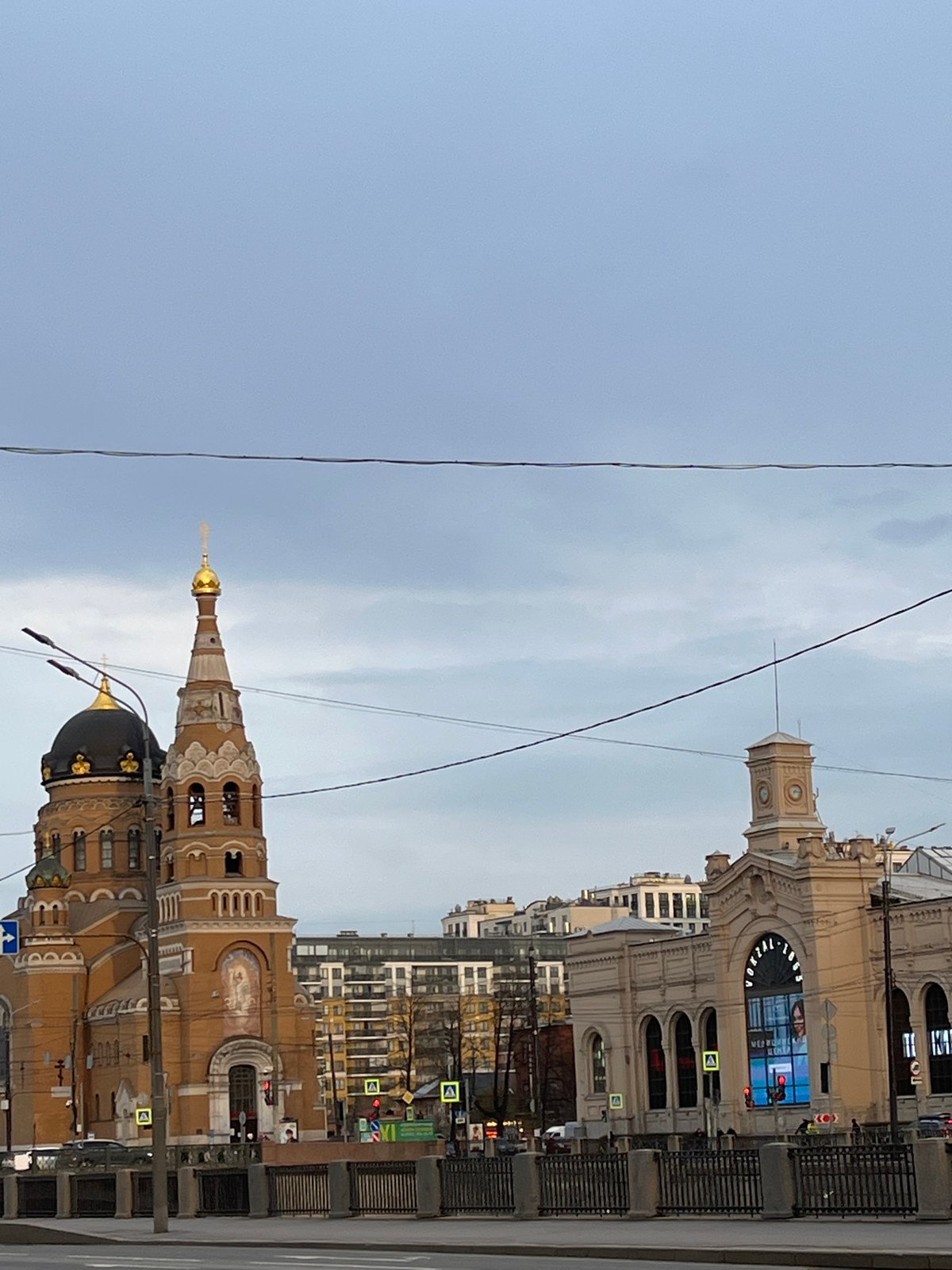 Church with golden spires photographed from multiple angles