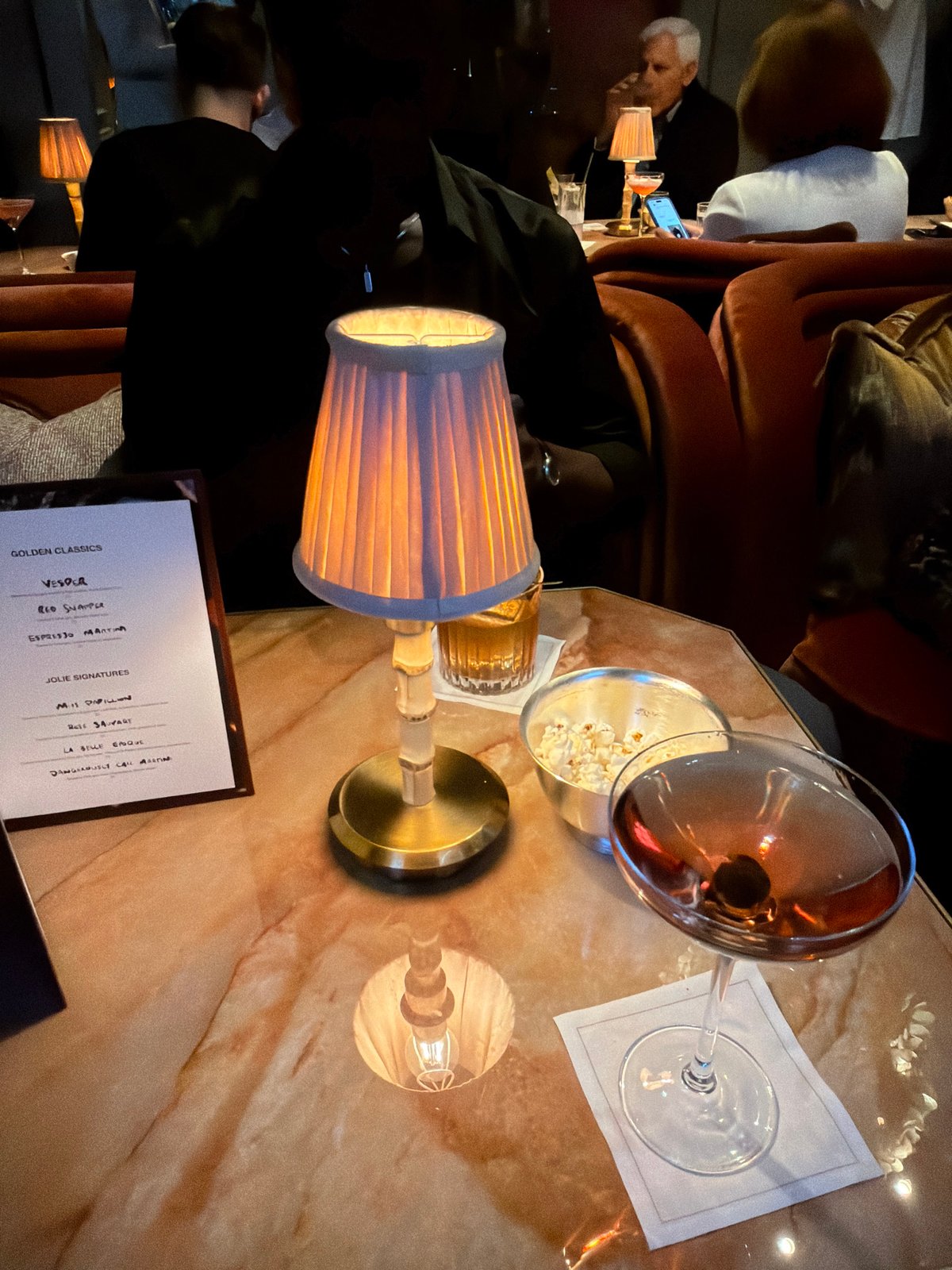 Evening dining and shopping scenes documented across Mayfair establishments