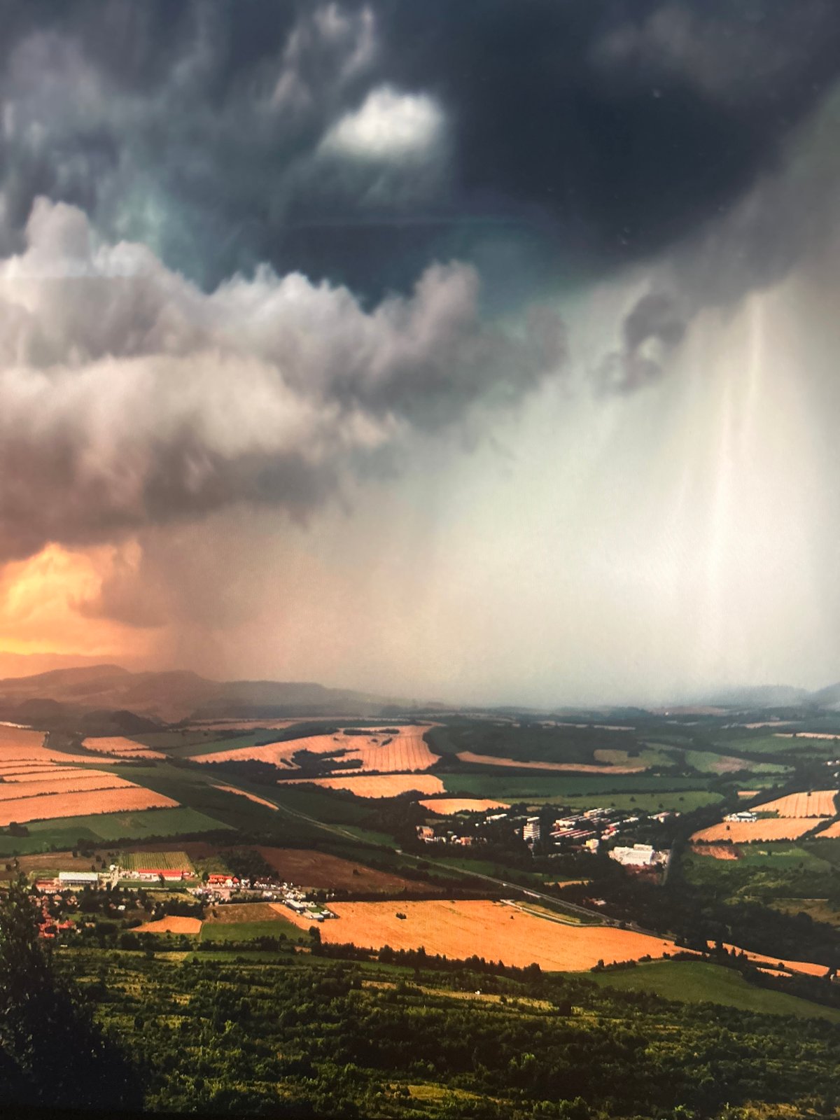 Dramatic storm clouds and sunlight captured over Kuala Lumpur