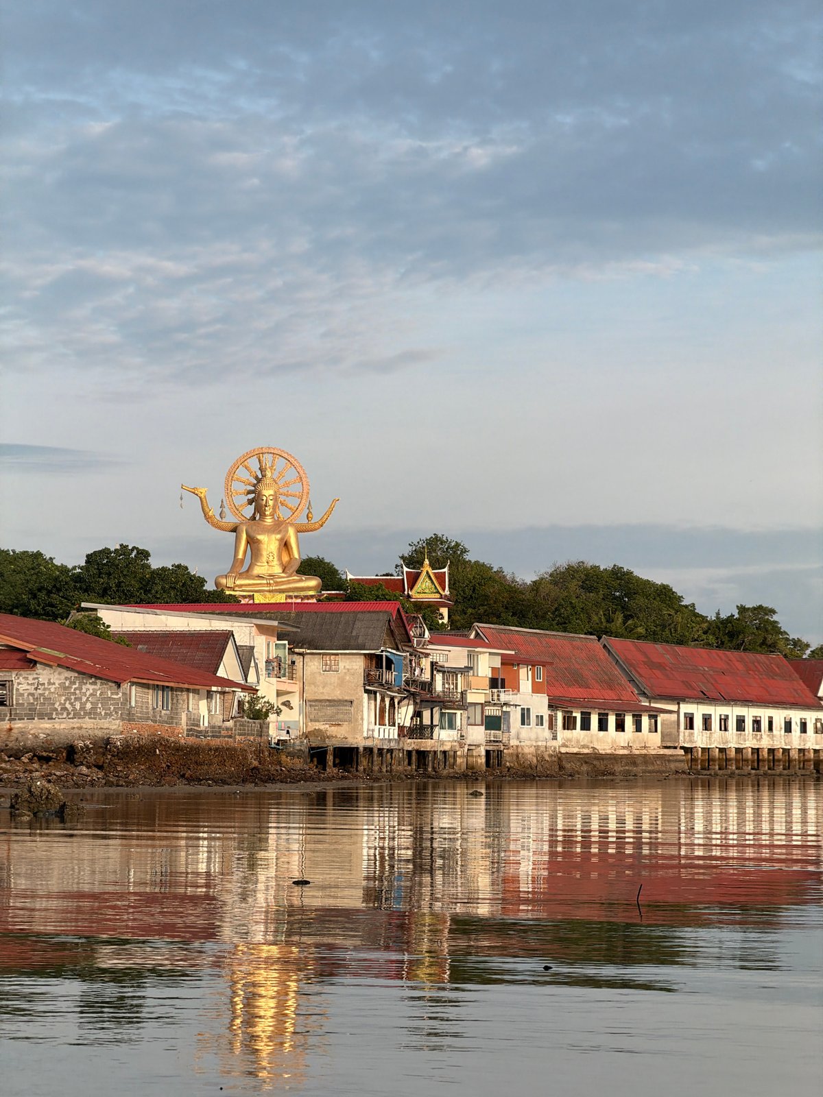 Ko Samui coastline, temples, and air traffic at sunset