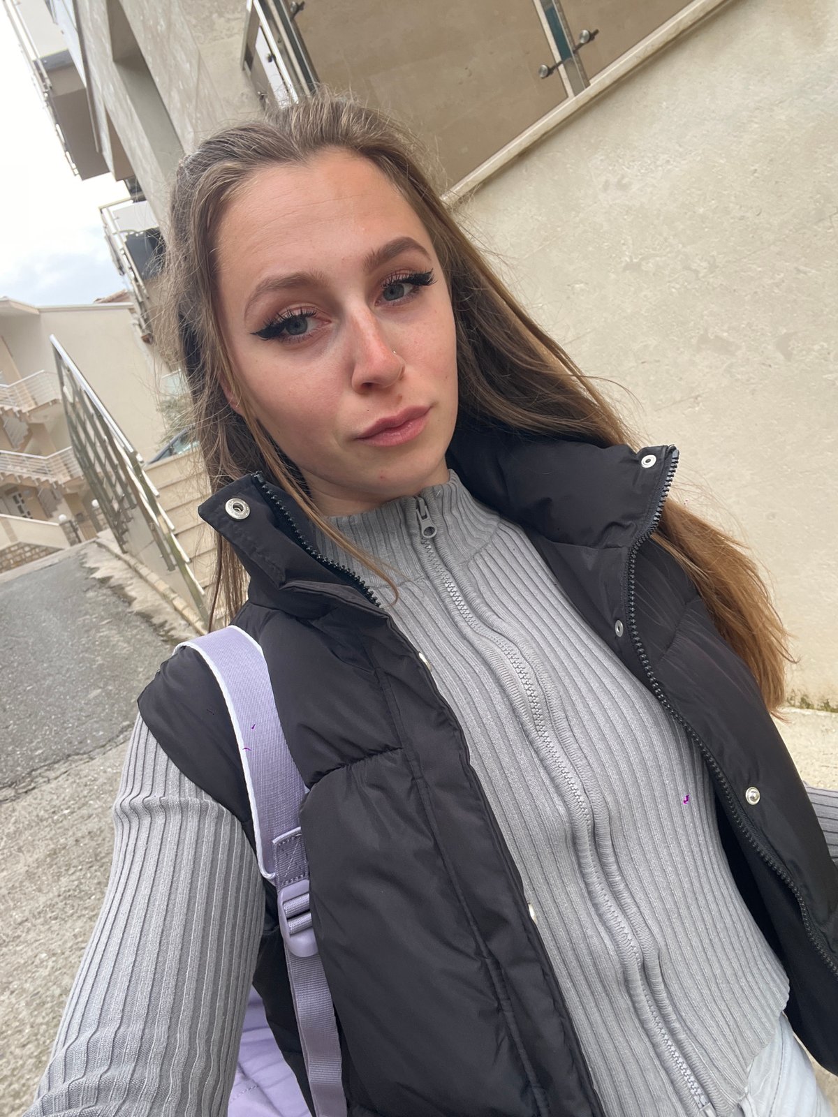 Woman takes selfie in Bečići, Montenegro