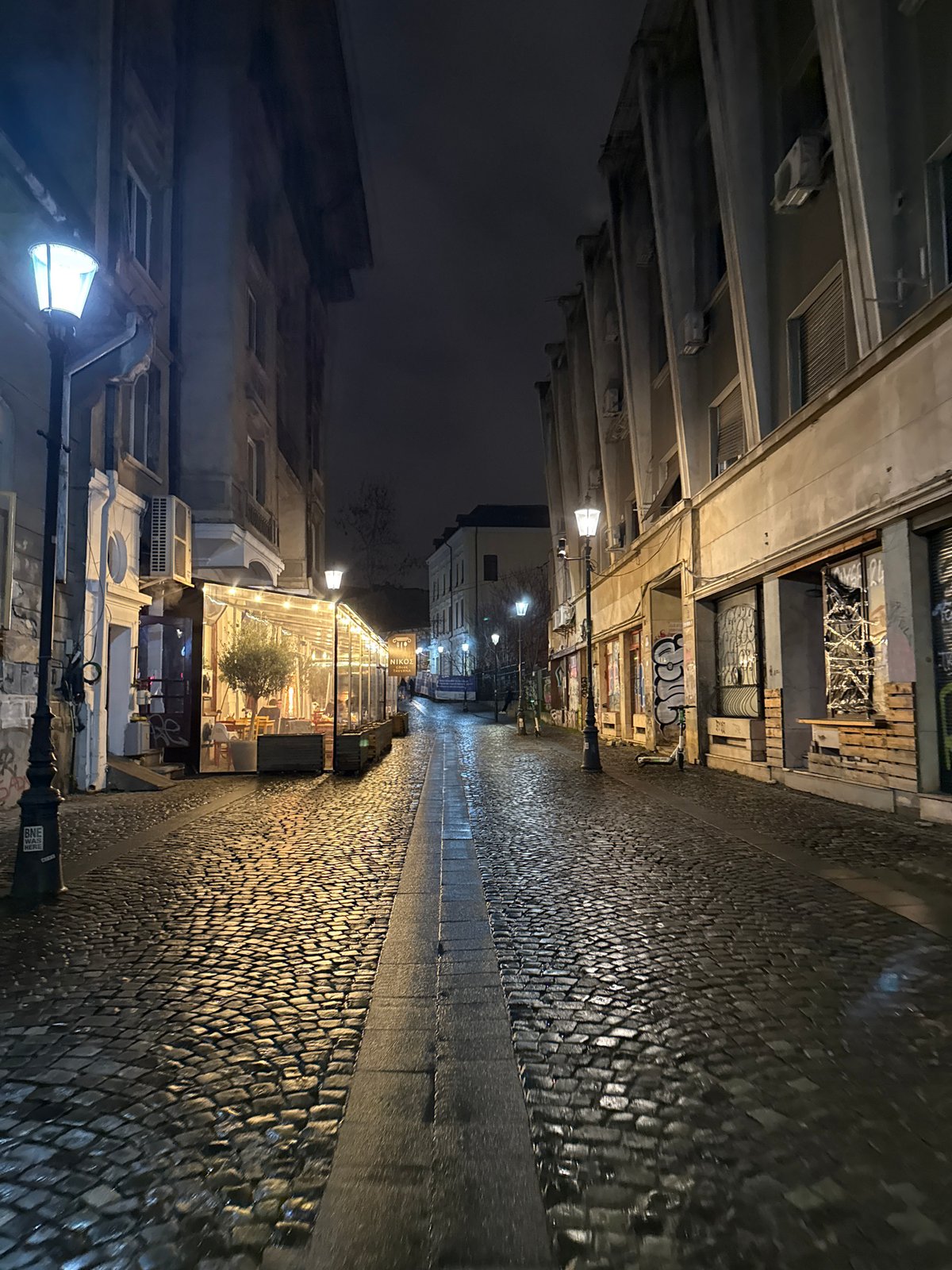Nighttime street scenes captured across central Bucharest