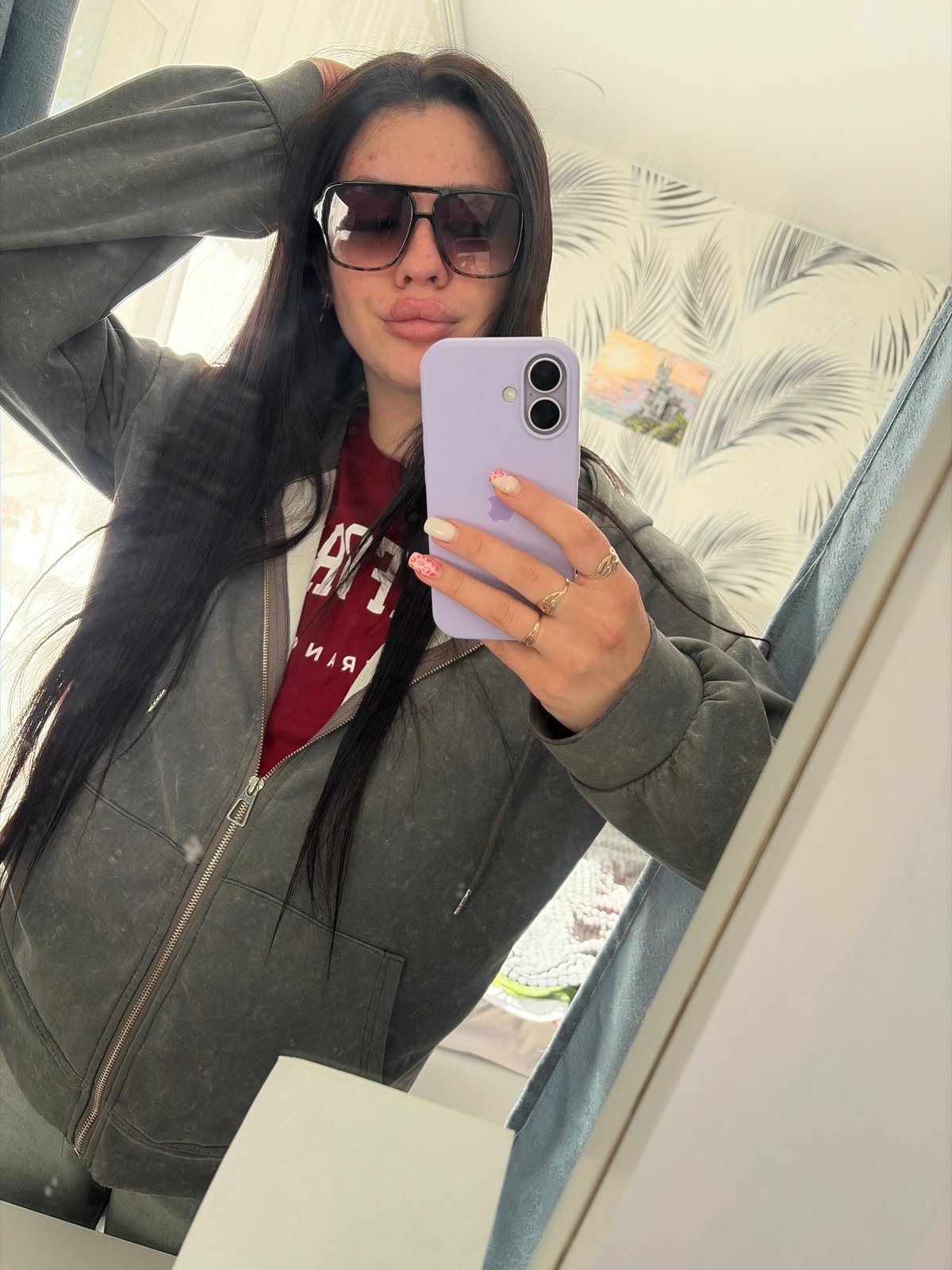 Woman takes mirror selfies in Russian village