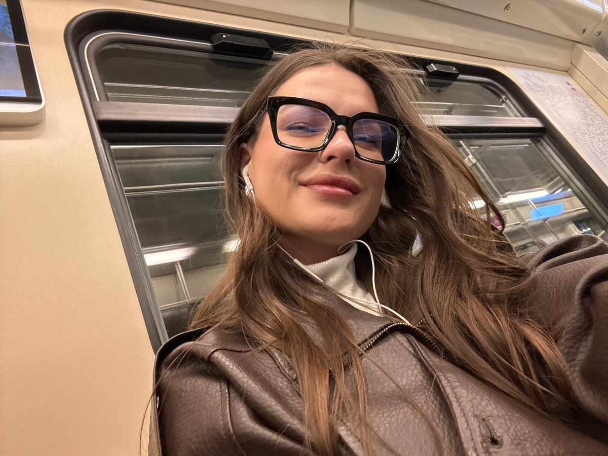 Woman takes selfie on Moscow Metro train