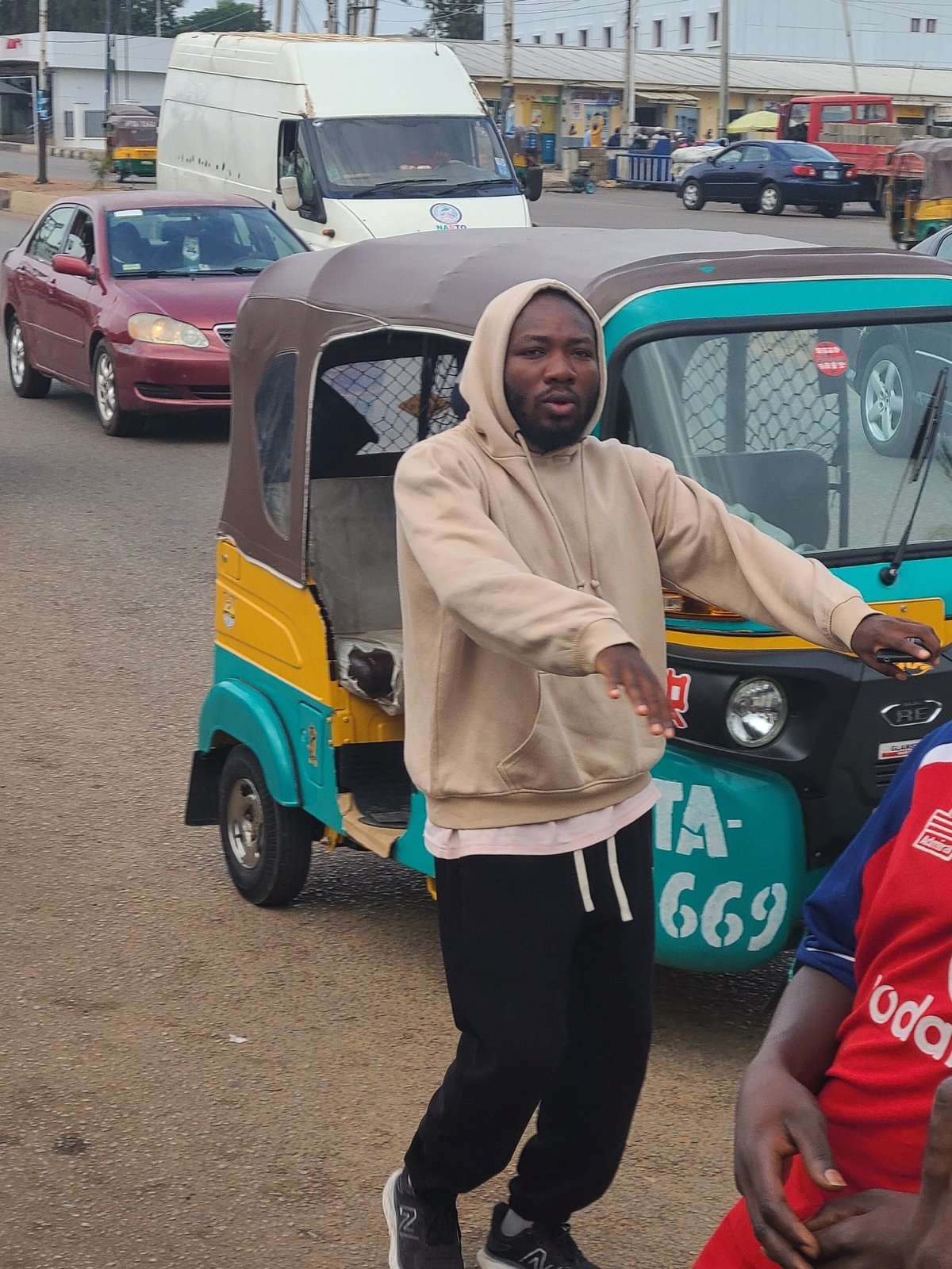 Urban morning: Four people documented in city street scenes