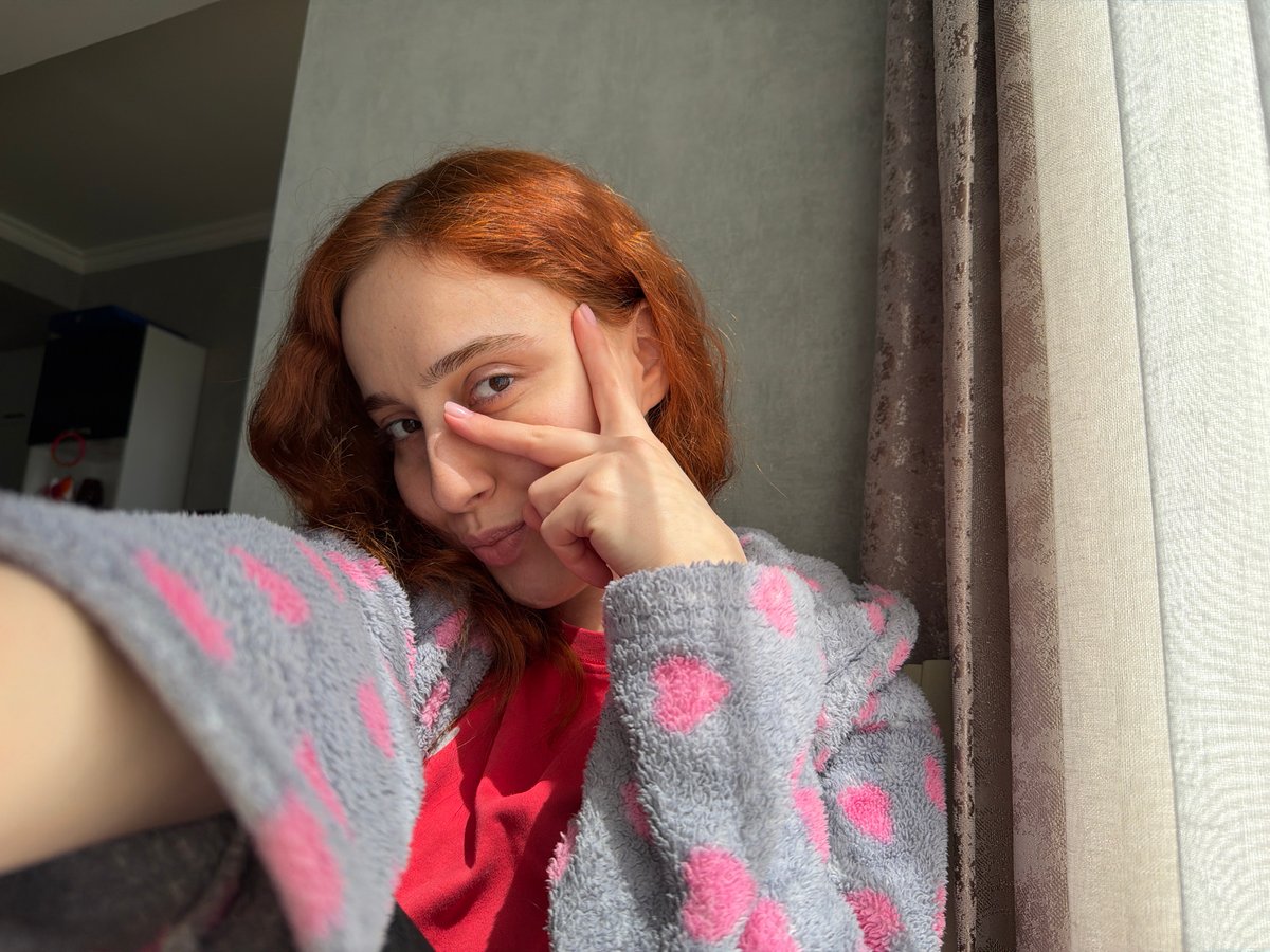Woman photographed in casual indoor setting in Tbilisi
