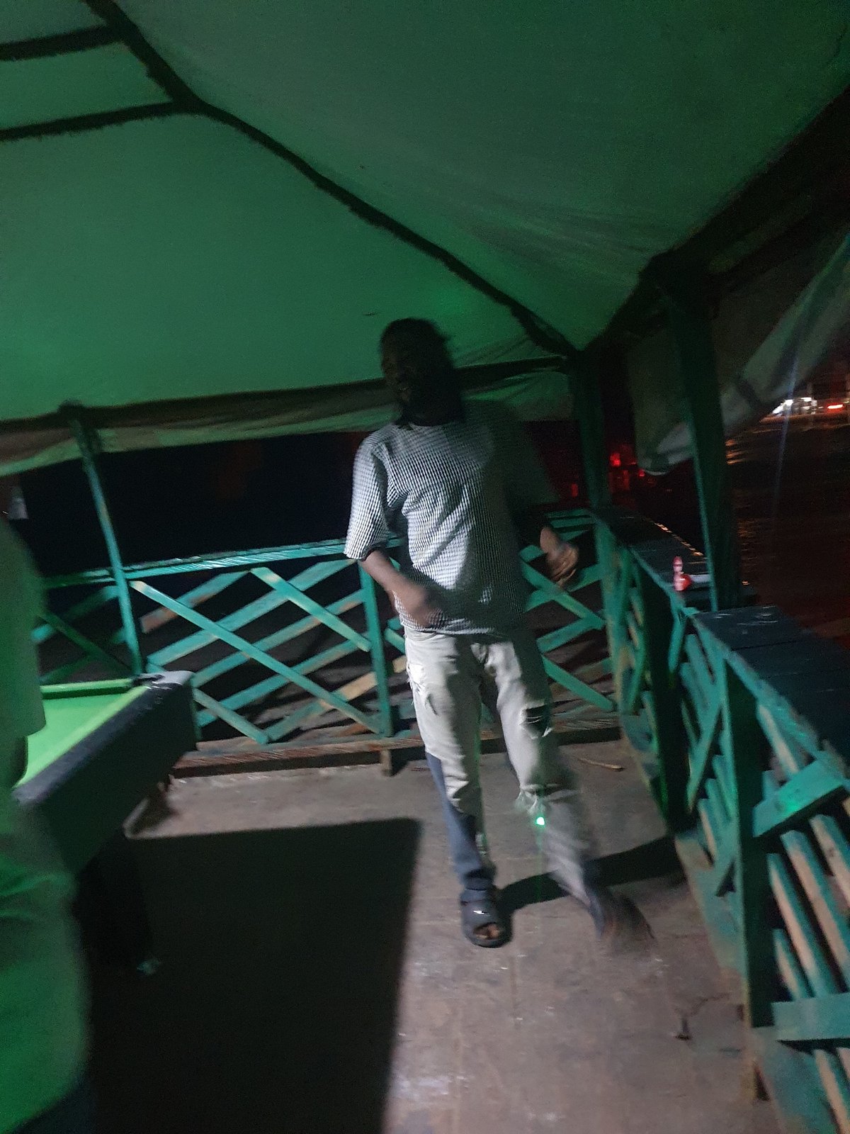 Evening pool sessions at an outdoor billiard spot in Lokoja