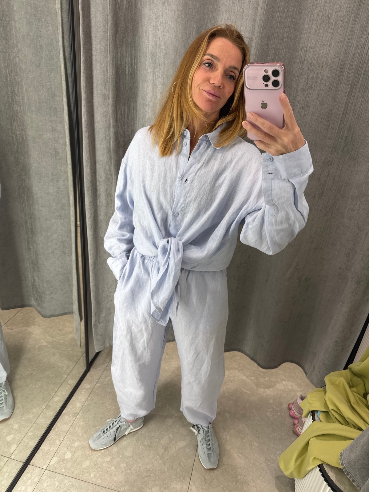 Woman shopping, taking selfies in Saint Petersburg retail locations