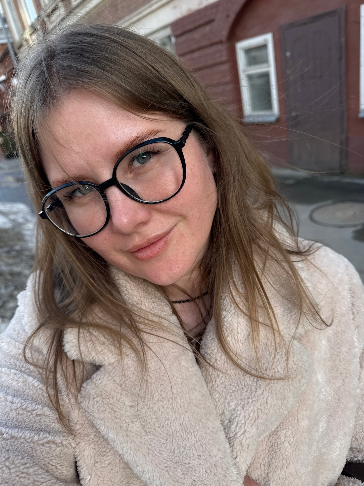 Urban scenes documented in Perm featuring woman and vehicle