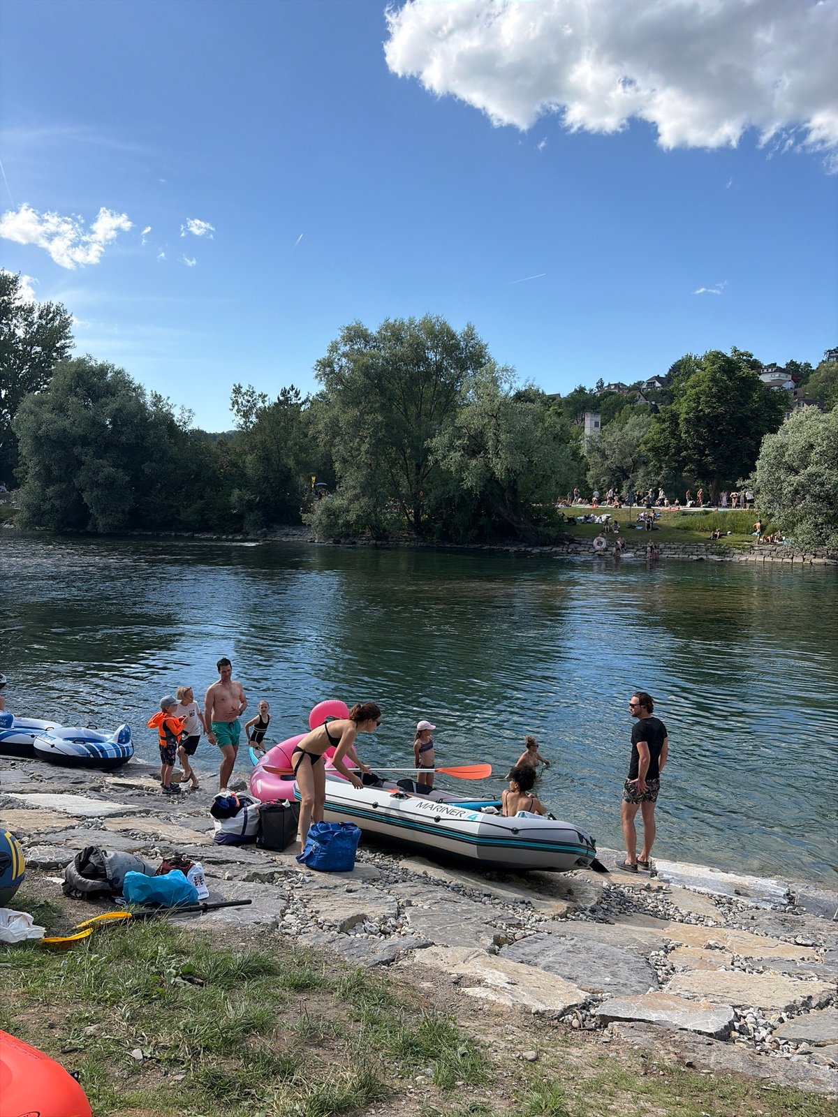 Summer river rafting preparations along Zurich's Limmat River