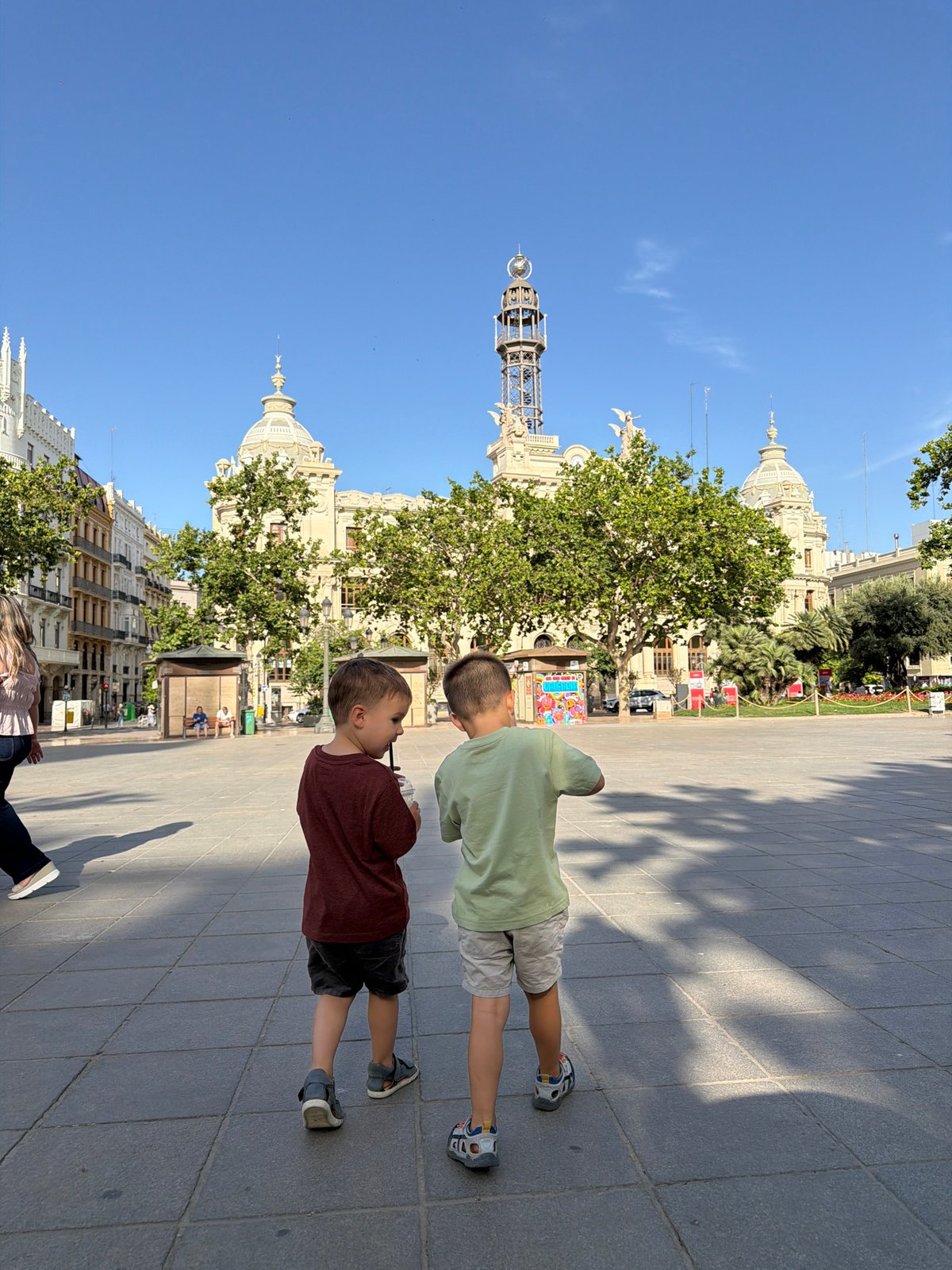 Plaza exploration in Valencia with historic architecture and fountains