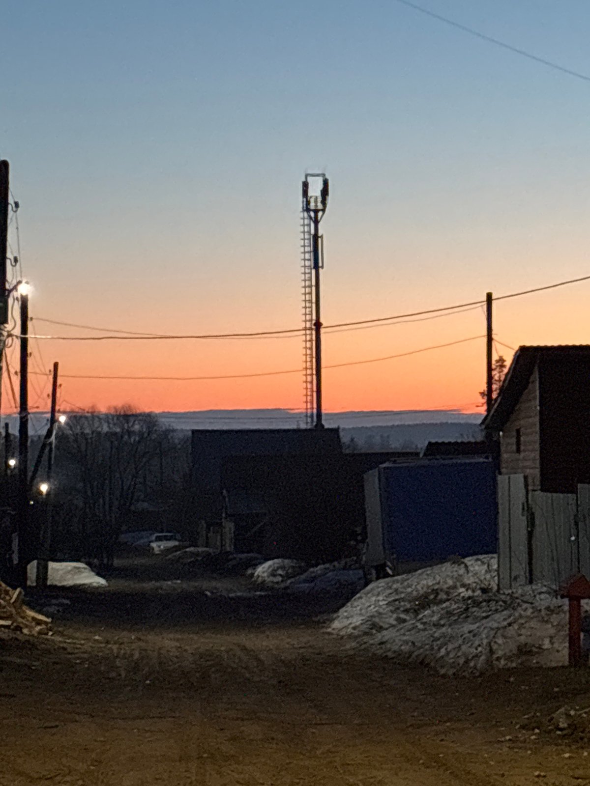Sunset documented across Chaikovsky streets during April evening