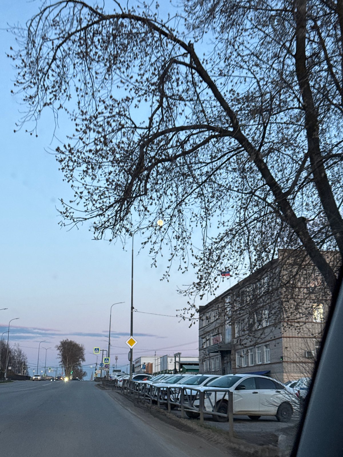 Urban evening scenes captured across city neighborhood