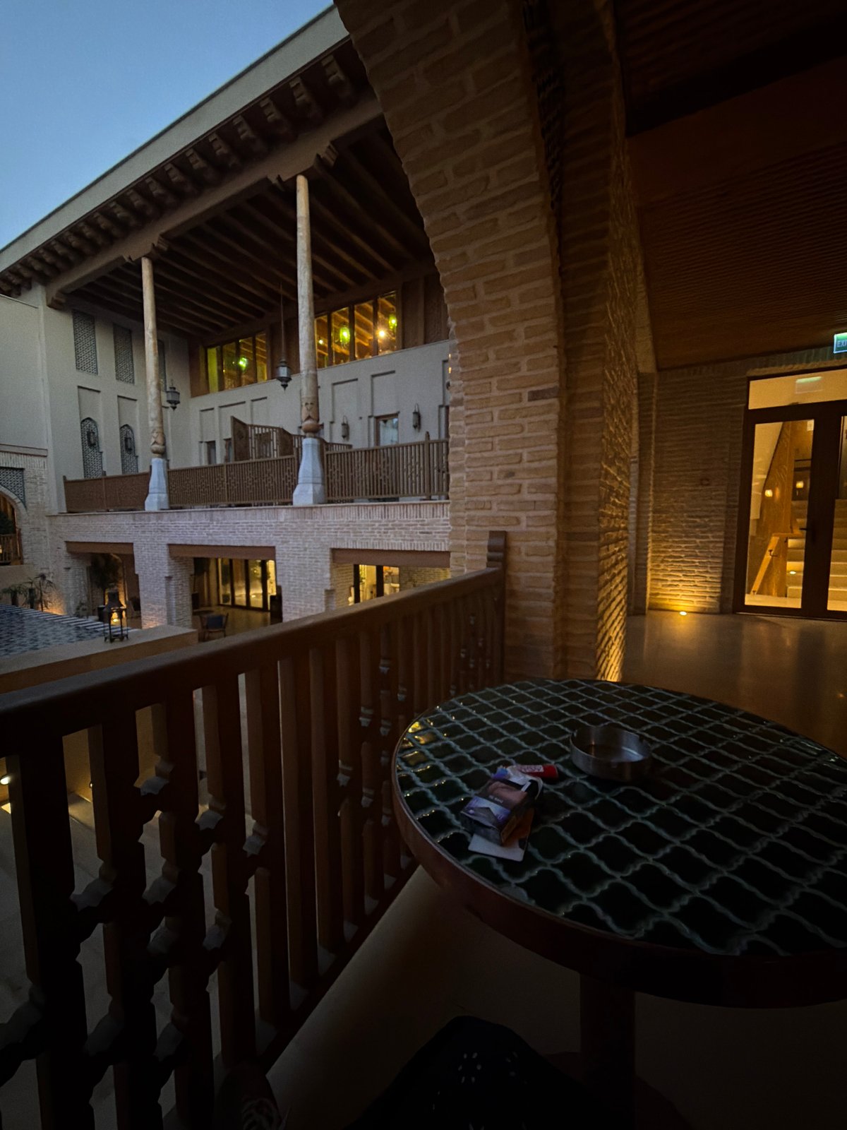 Evening architectural documentation in historic Bukhara courtyard complex