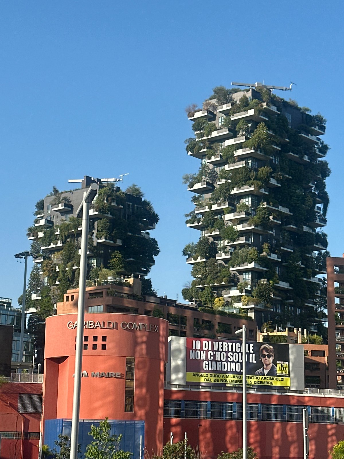 Milan's Porta Nuova district: modern towers and street-level scenes
