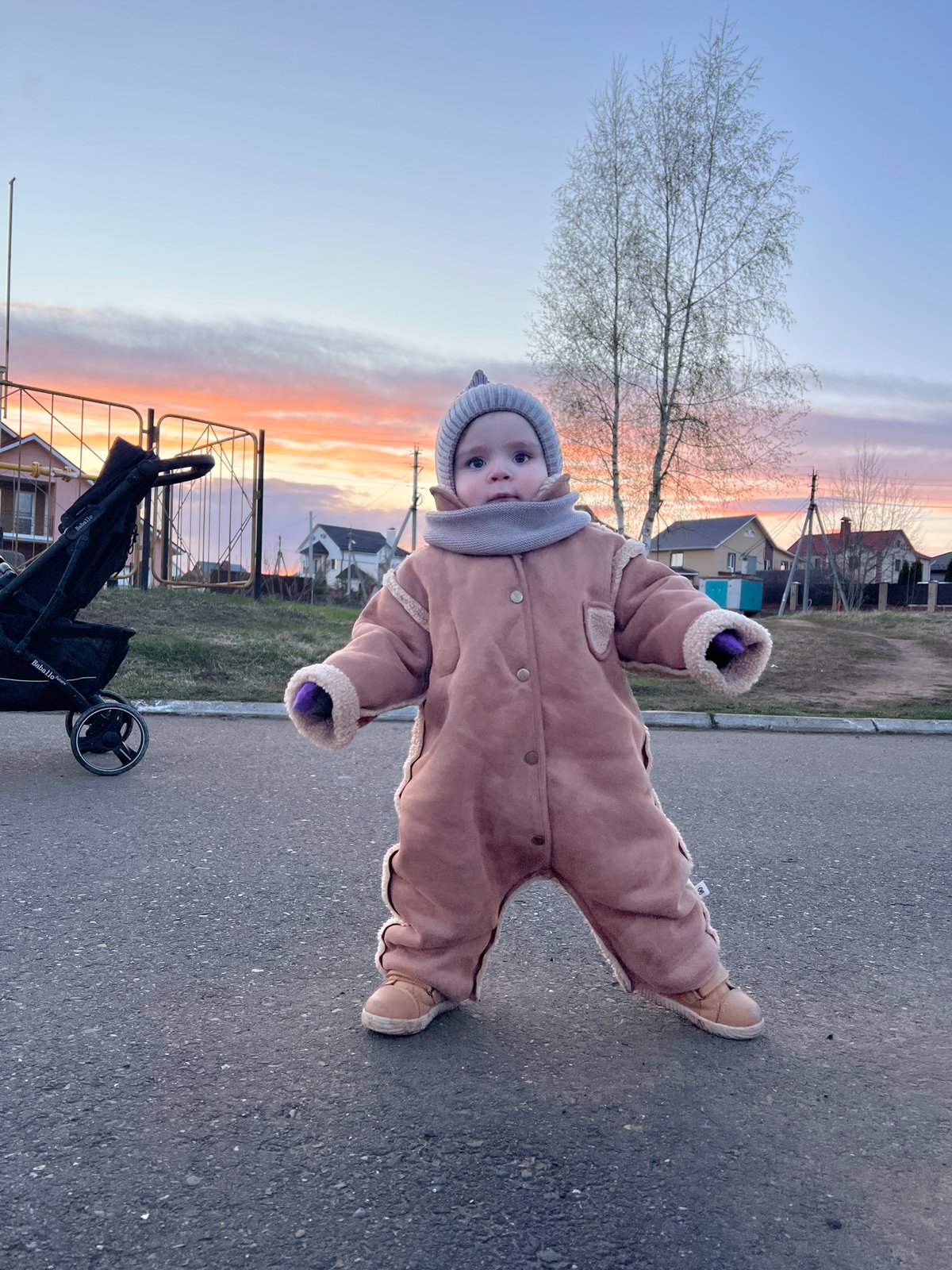 Family evening stroll captured during sunset in Noviy, Russia
