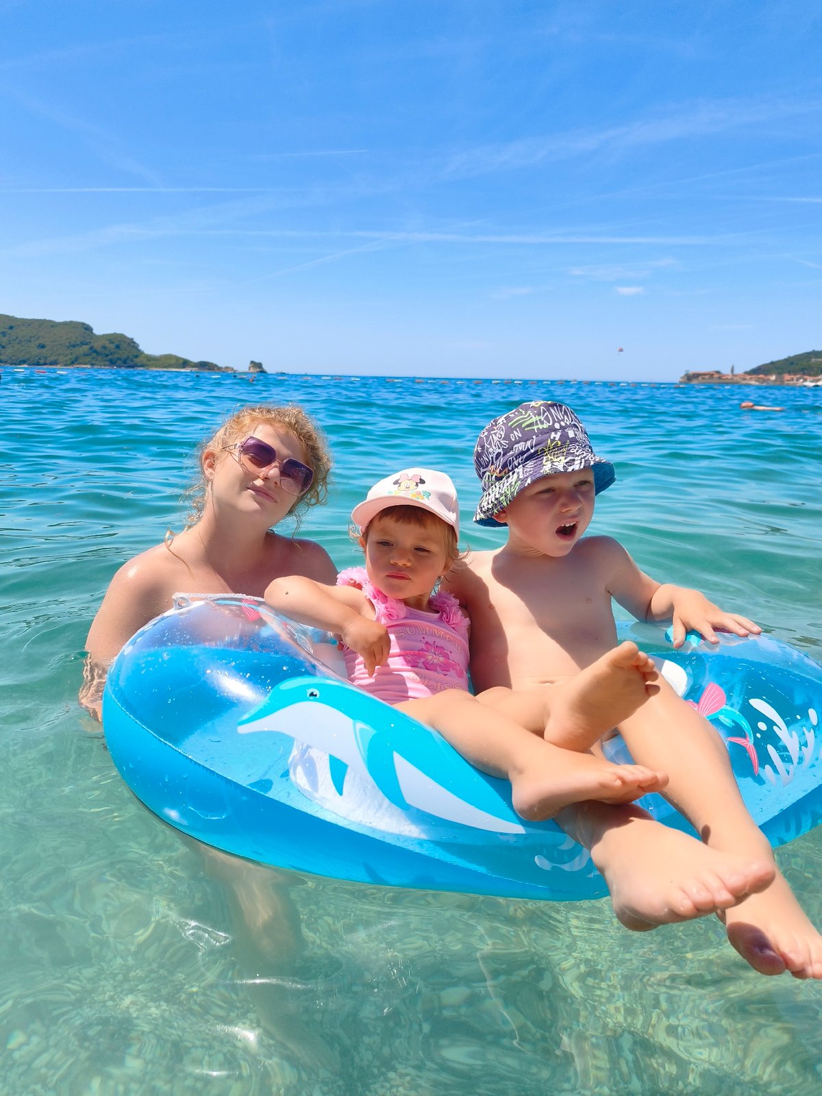 Family enjoys morning beach time in Budva, Montenegro