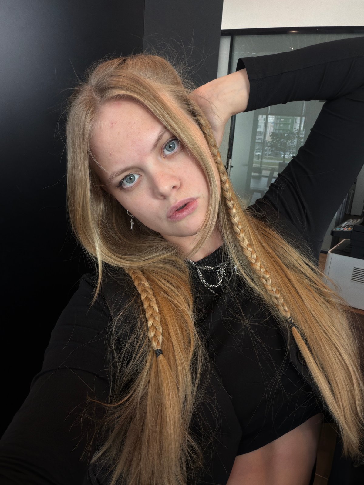 Woman takes mirror selfies in Izhevsk restroom