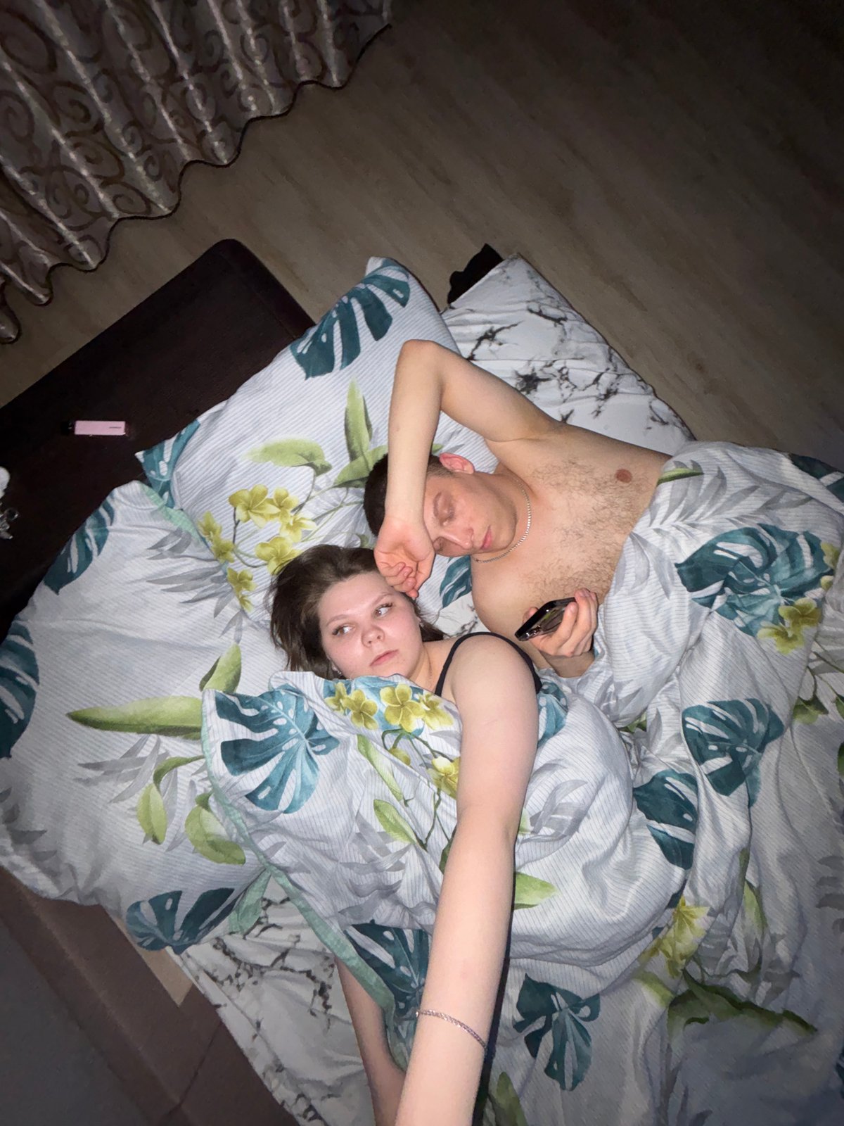 Couple takes selfies in bed in Chaikovsky, Russia