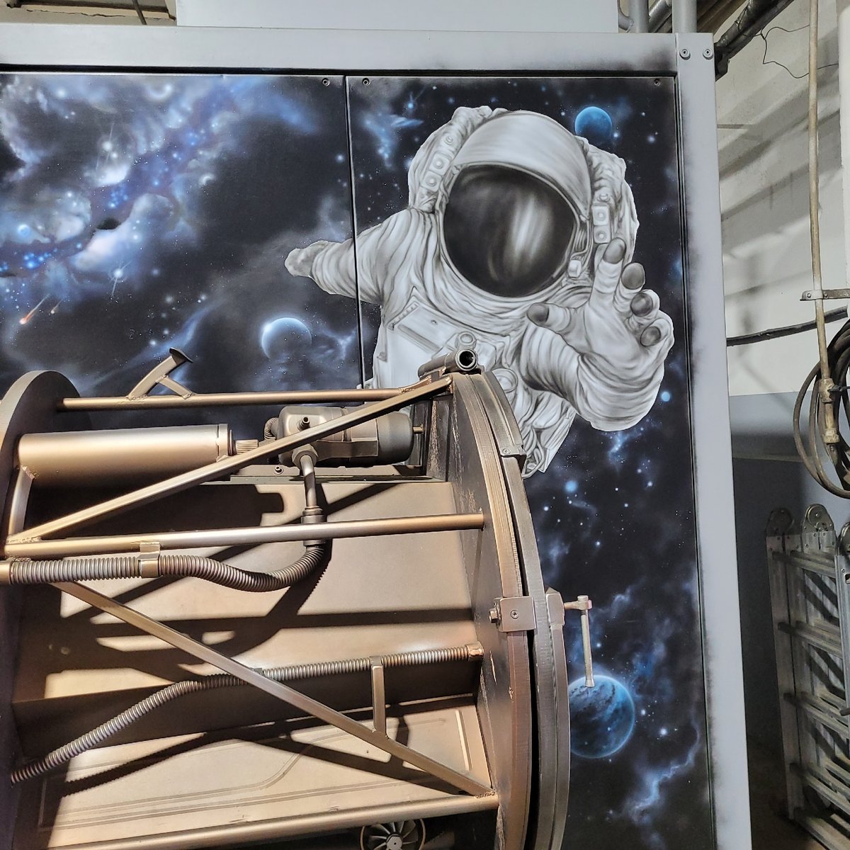 Industrial facility with space murals documented by visitors
