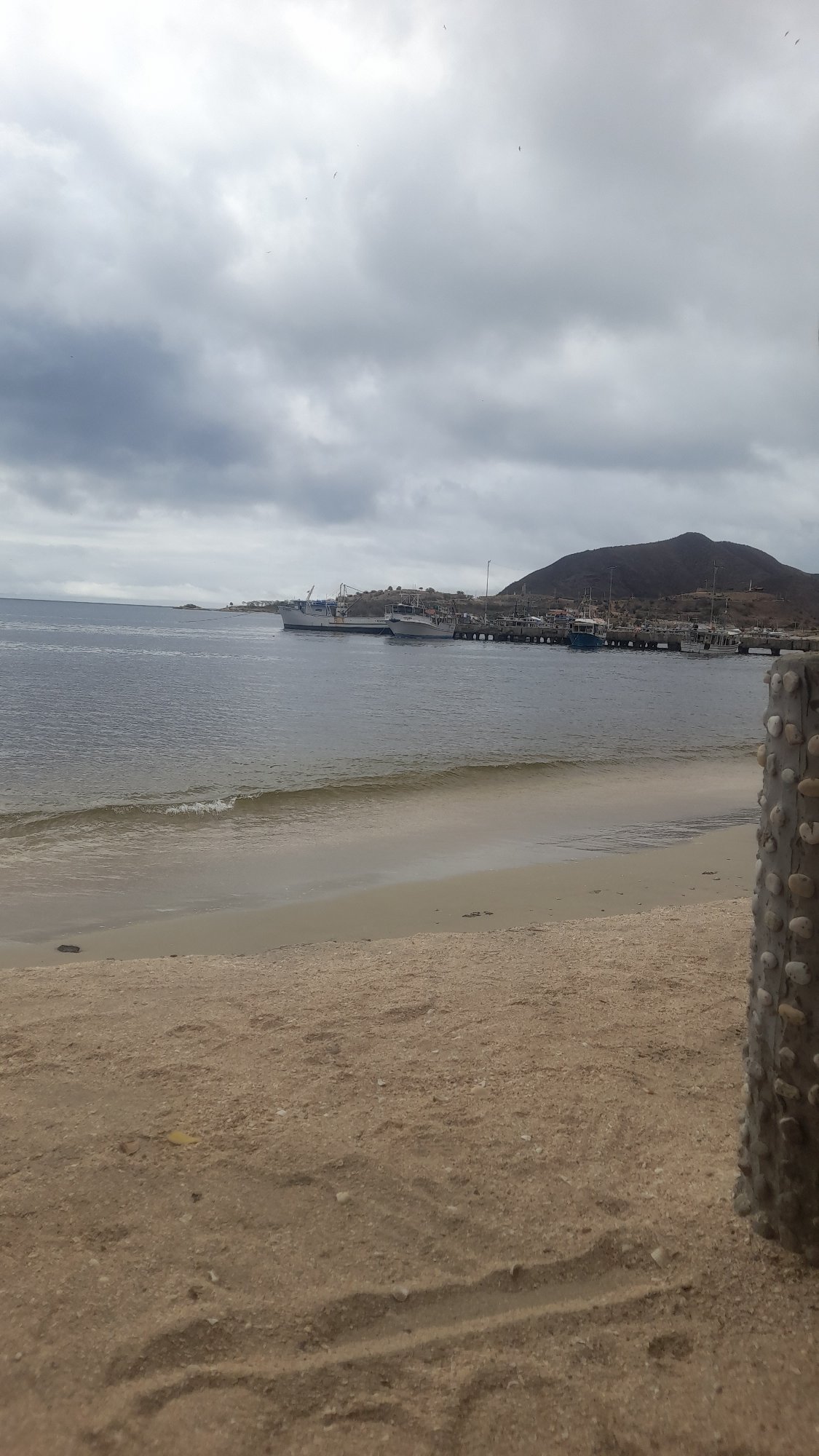 Overcast afternoon exploring Juan Griego harbor and coastline