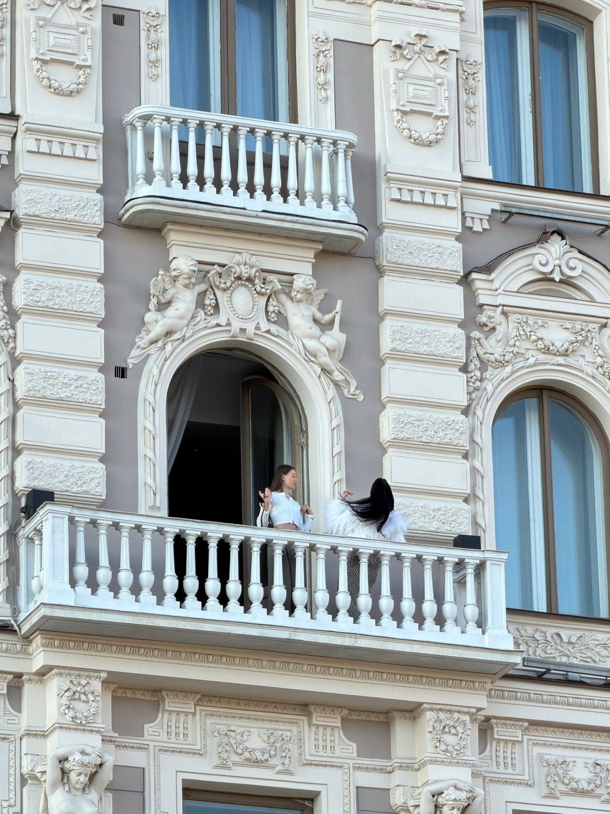 Street life captured around ornate Saint Petersburg buildings