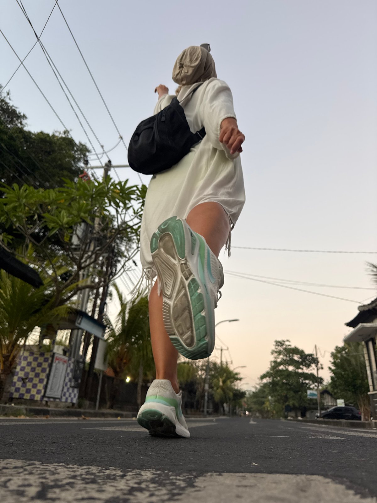 Dusk stroll through Kuta — movement, flowers, and a full moon