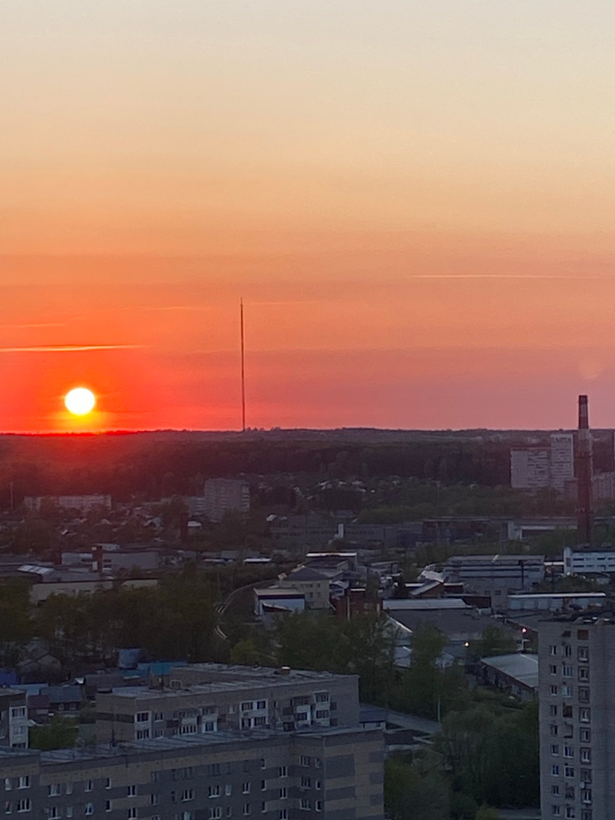Sunset observed over Izhevsk, Russia with vibrant sky colors
