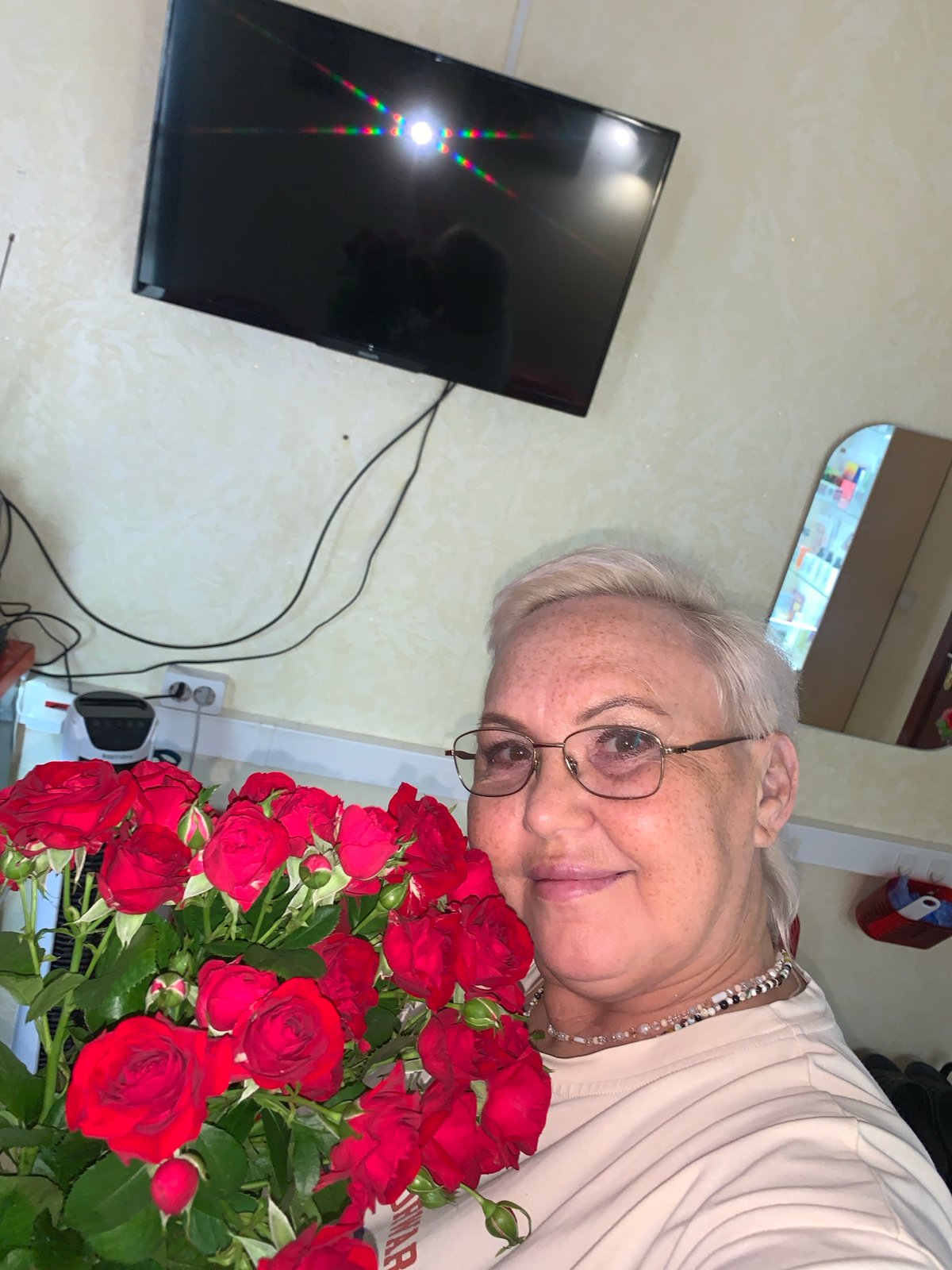 Red roses and selfies in Chaikovsky on a summer morning