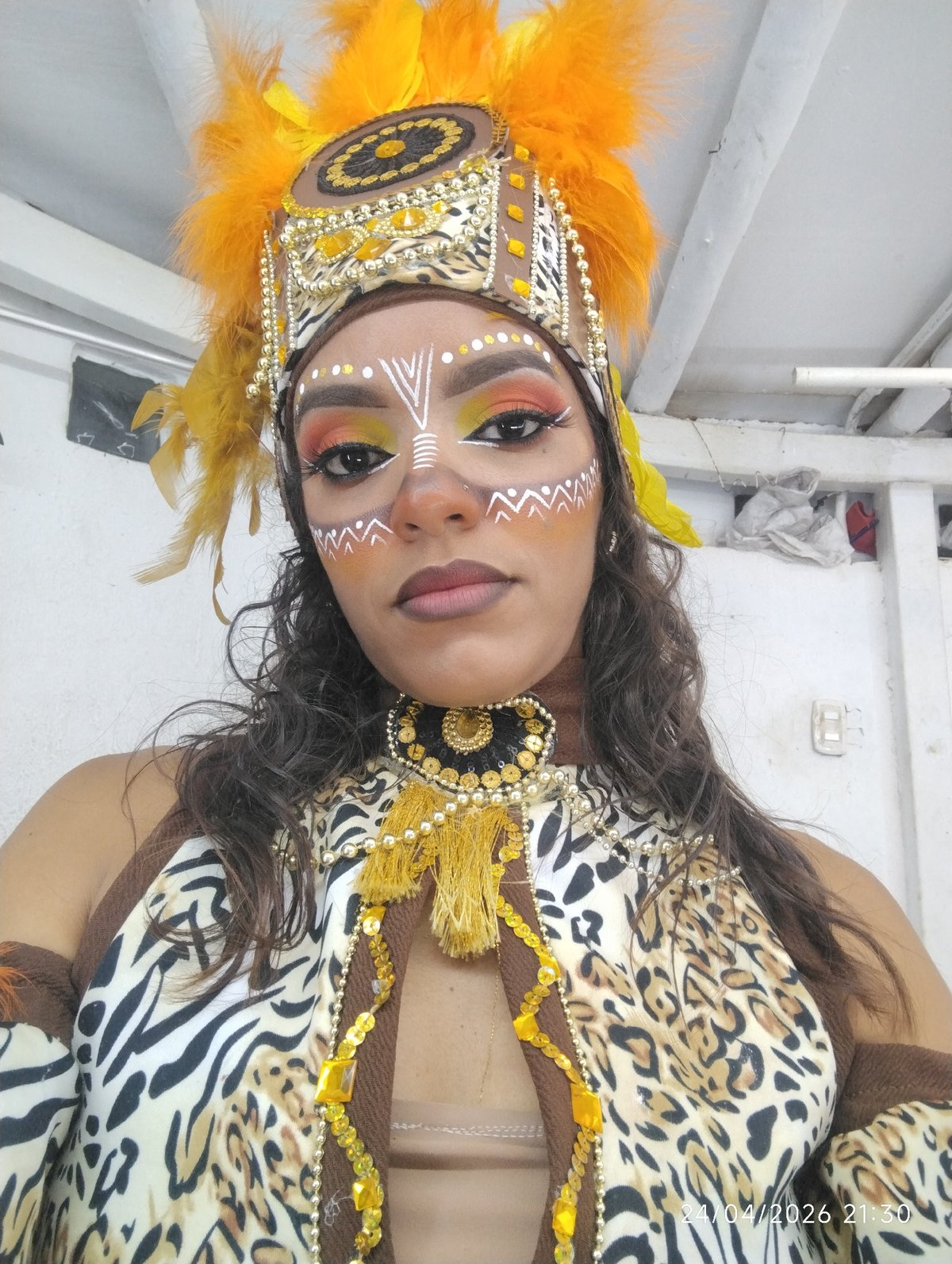Woman spotted in tribal ceremonial dress with feathered headdress