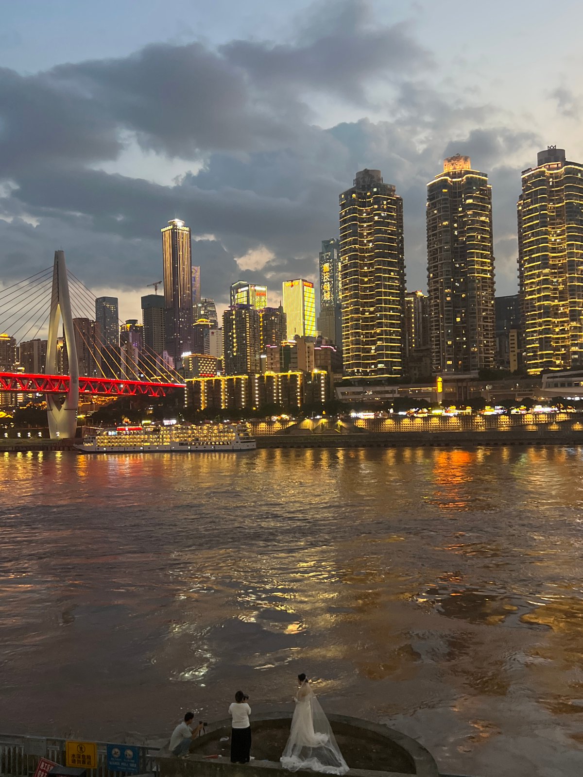Chongqing skyline and river bridges at dusk and night