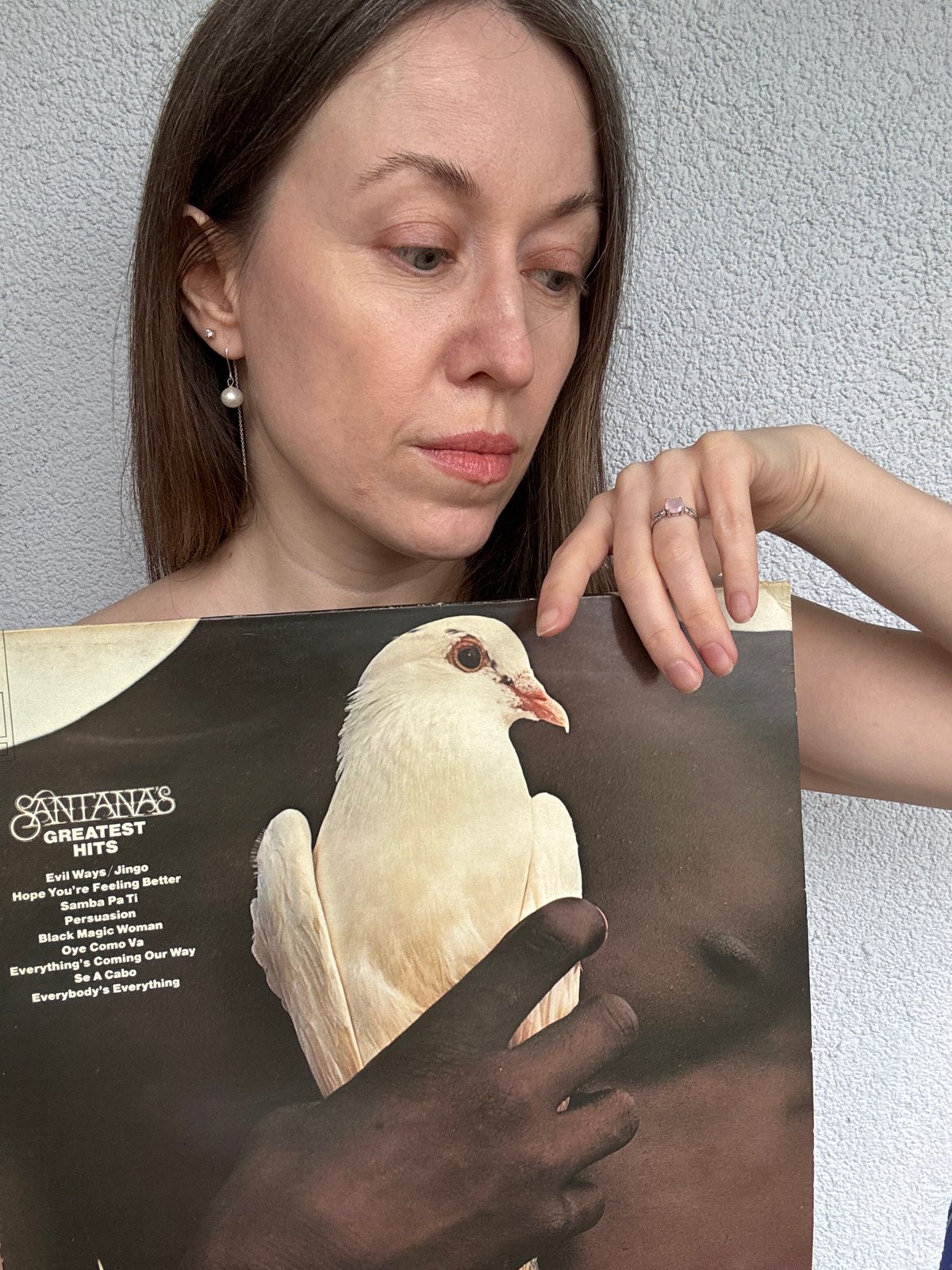 Woman poses with vinyl records in Kudrovo, Russia