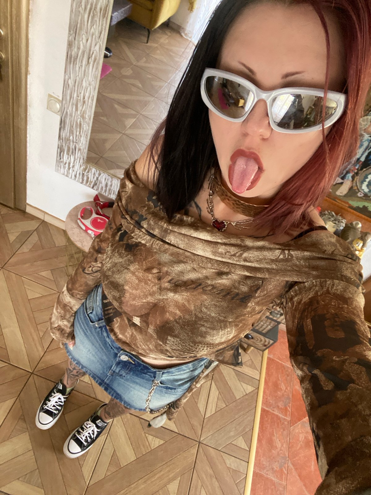Woman takes selfies in Kunje, Montenegro home