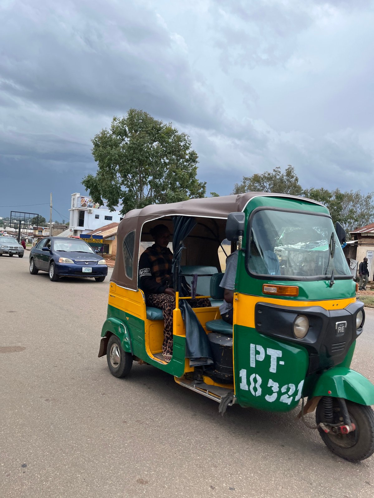 Everyday street life and market activity in Jos, Nigeria.