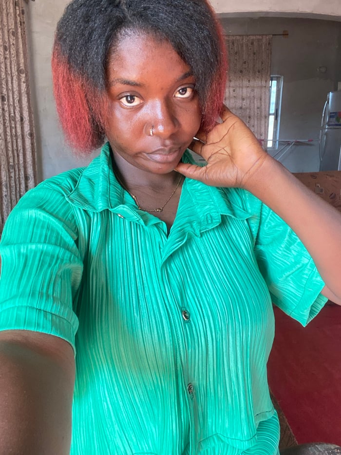 Woman takes selfies with stuffed animals in Nigerian towns