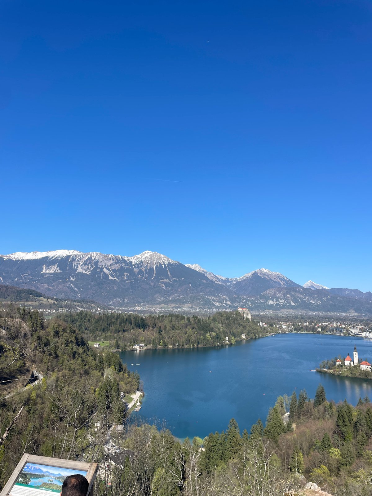 Tourists document scenic Lake Bled views in Slovenia