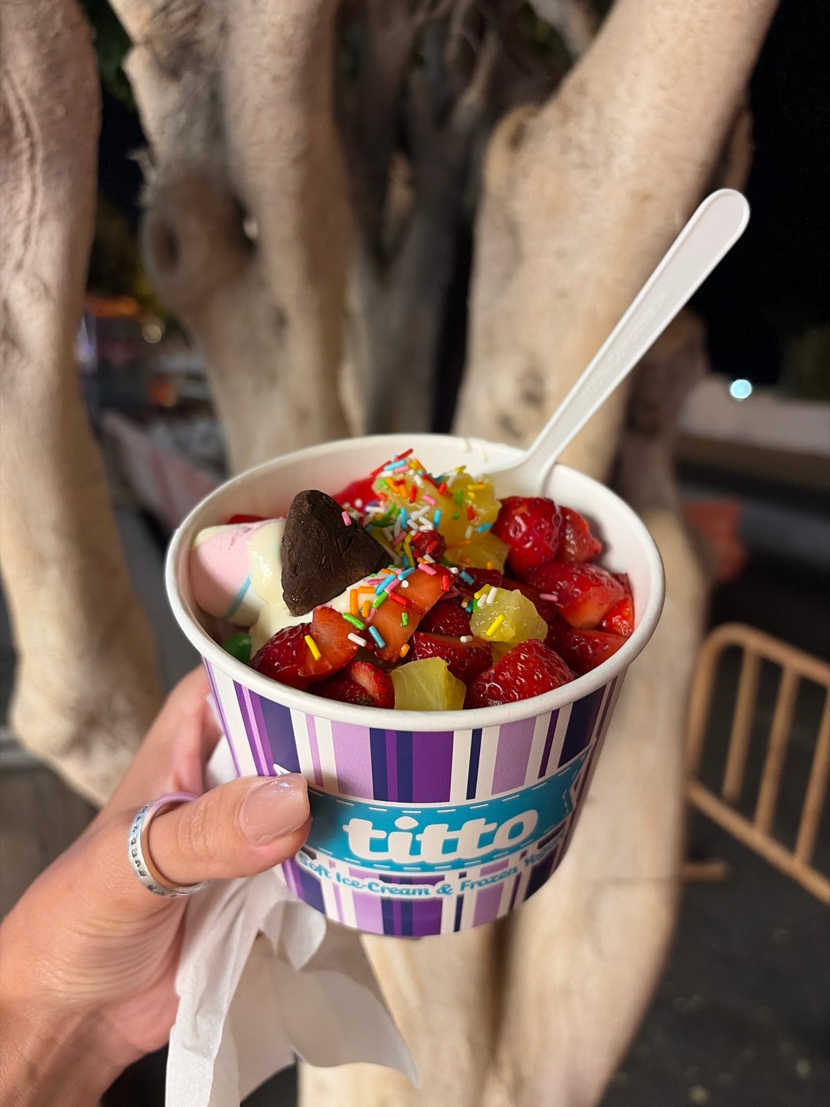 Tourist enjoys frozen treat in Puerto Del Carmen