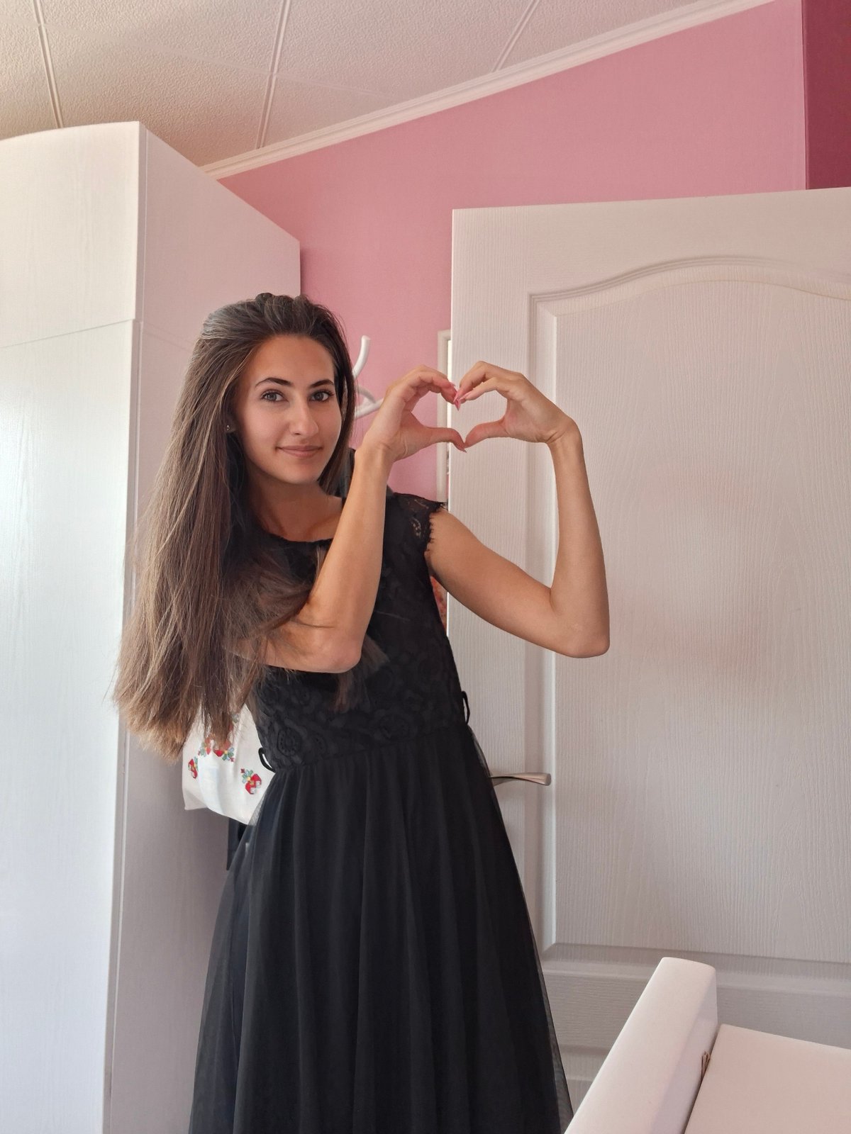 Black dress selfie session, plus a dog cameo