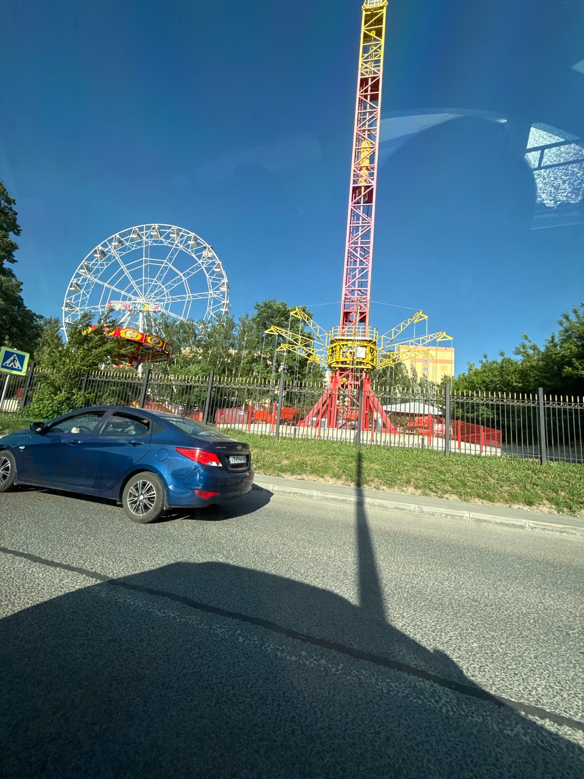 Car parked near carnival rides in Izhevsk
