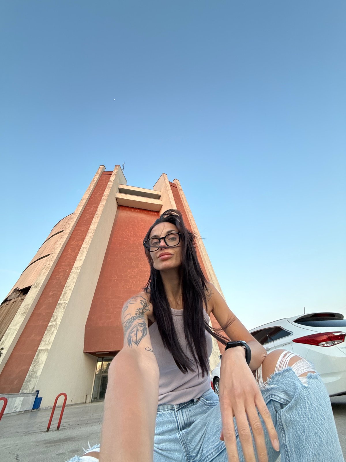 Woman photographs herself around Pleven during golden hour