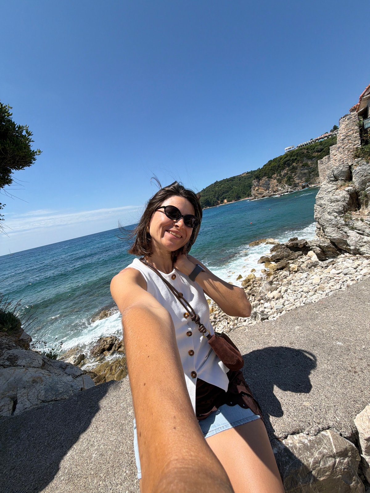 Tourists capture sunny morning selfies along Budva Montenegro coastline